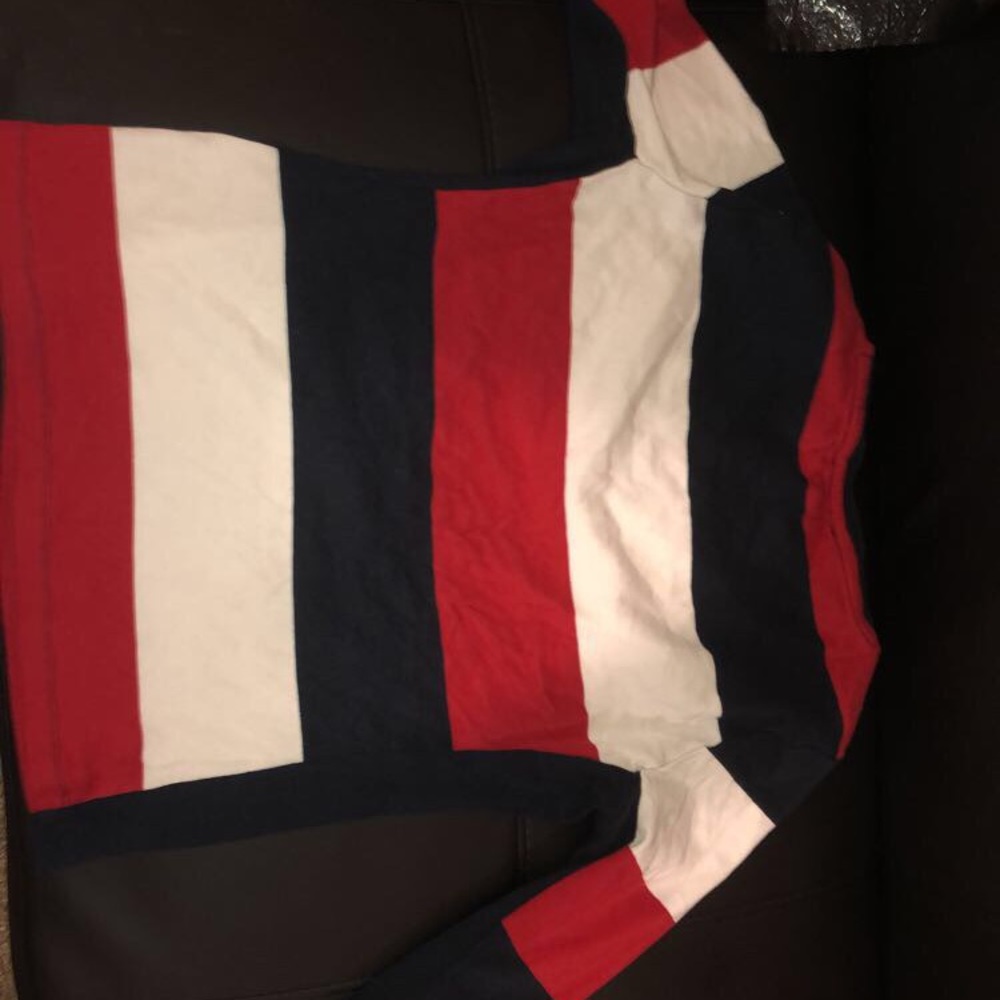 A white red , and black shirt